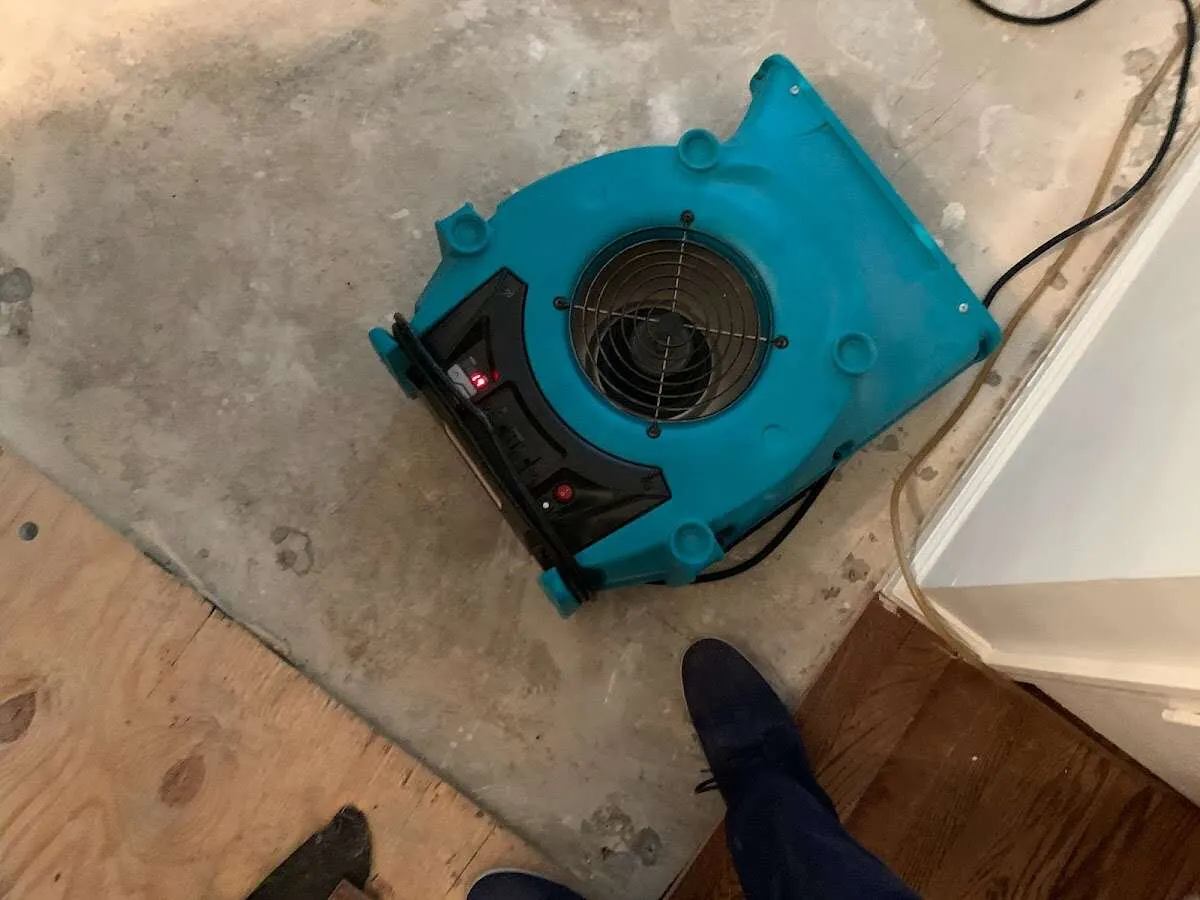 Air mover drying subfloor during Leak Detection & Repair in Estacada